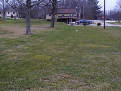 Rear exterior with back yard.