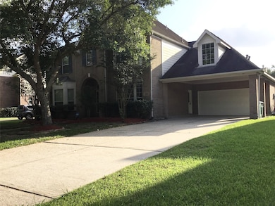 Two car garage with porch.