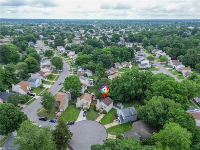 Aerial view and home in situated on a cul-de-sac..