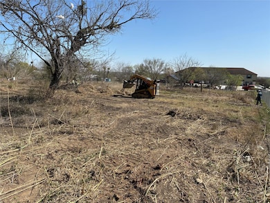 View of yard with a rural view