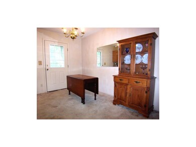 Roomy dining area, door is to back deck. Hardwood 