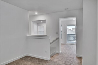 Hall featuring recessed lighting, baseboards, carpet flooring, and an upstairs landing