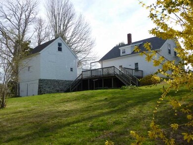 Exterior Back. Private yard with large deck and ac