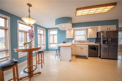 Eat-in kitchen. Lots of windows for natural light.