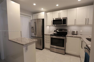 470 Paradise Isle Blvd unit 107, Hallandale Beach, FL 33009 - photo 2