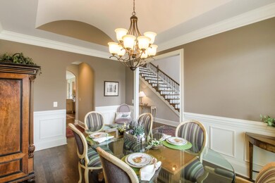 Formal dining room features a beautiful barrel ceiling.