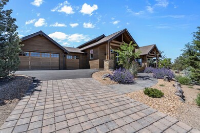 A beautiful paver drive greets you