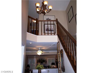 Foyer - Vaulted foyer with lots of windows & skyli