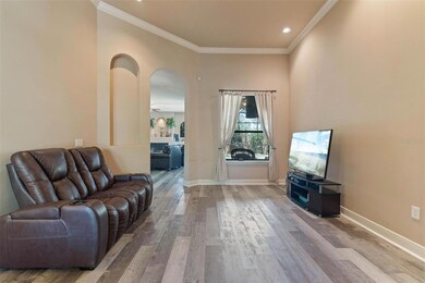 From front door overlooking formal rooms to main living room/pool.