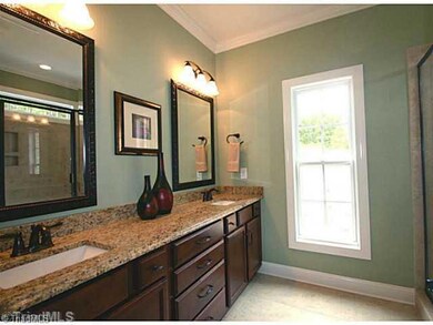 Master Bath/Spa. Nice master bath with granite, dual sinks, tile shower, and tile floor.