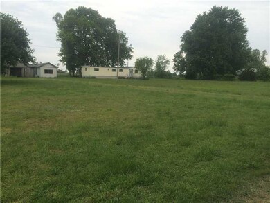 Land. The land is level.  Comes with City Water, E