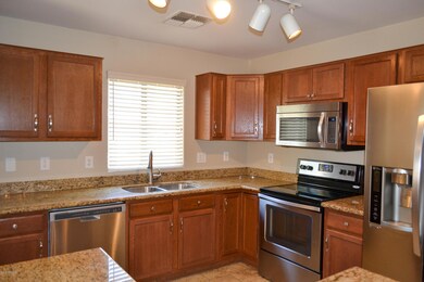 KITCHEN w/GRANITE AND STAINLESS STEEL