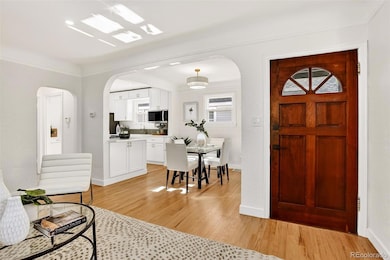 Solid Mahogany door greets guests as they enter from the front porch.