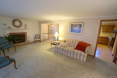 Bright & Open with classic gas fireplace.