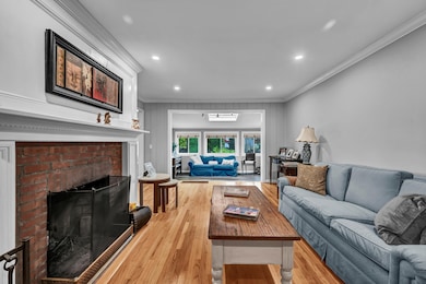 Living Room with recessed lighting and wood-burning fireplace for cozy evenings!