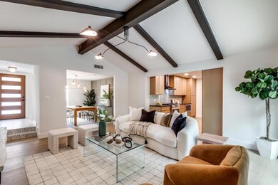 Living room with light wood finished floors and b
