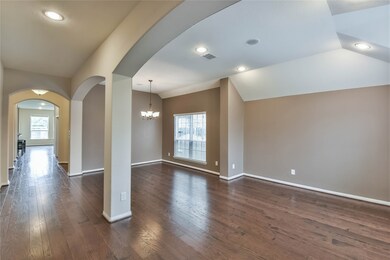 Beautiful Flooring Flows from Foyer to Formals, To Flex Room to Family area. High Ceiling, Home Stereo installed.