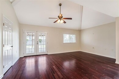 French doors lead to the backyard