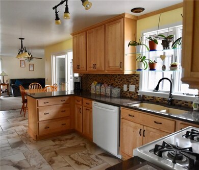 Beautiful Quartz counters, rich cabinetry and upda