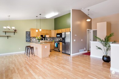 BRIGHT, OPEN KITCHEN.