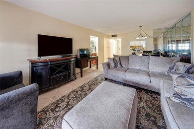 This condo features a spacious living and dining a