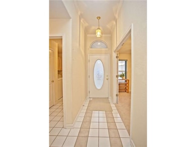 Exterior Front. Front door Entry way. Formal Dining room to the right, Laundry & garage to the left