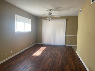Unfurnished room featuring baseboards, visible ven