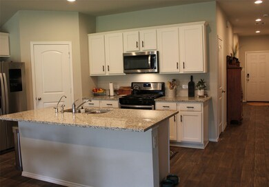 This kitchen is a dream with the large island allowing more seating