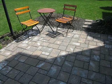 Exterior Front New paver front walkway - patio