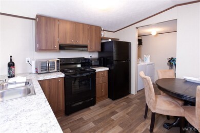 Kitchen featuring vaulted ceiling, independent was
