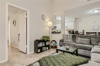 Living area featuring light wood-type flooring an
