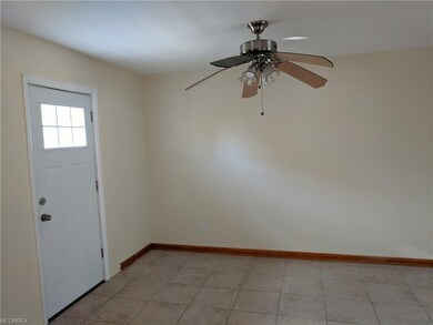 Eat-in kitchen with door to the large deck.