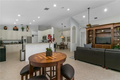 Huge Great Room opens to kitchen and dining area.
