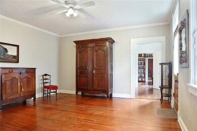 Living room leading to hallway and bedrooms