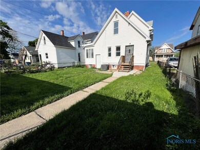 Rear entry and yard with alley parking