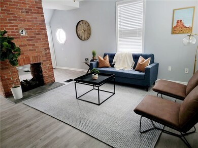 Enjoy the fireplace from the whole first floor