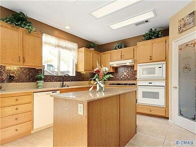 Remodeled kitchen with granite counter tops.