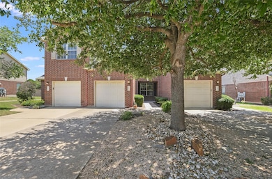 Obstructed view of property with concrete drivewa