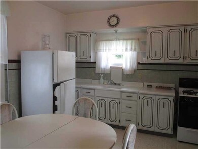 Kitchen. Large Kitchen!!  Two windows and a door t