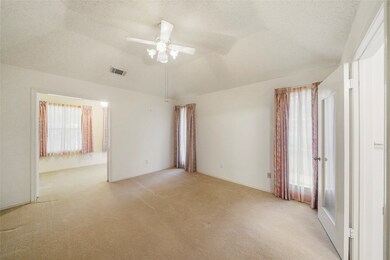 Spacious primary bedroom with adjoining study/sitt