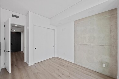 Unfurnished bedroom featuring light wood-style fl