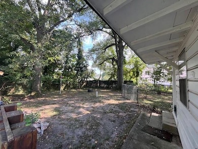 Fenced backyard and private back entrance
