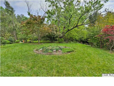 The landscaping is extensive and mature, with lots