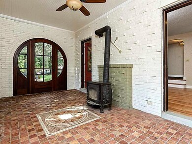 Sunroom. Three or Four season room with wood burni