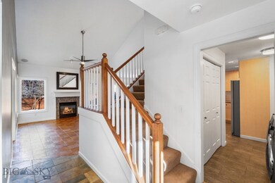 Entry, stairs to second level, hall to kitchen and