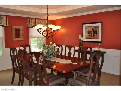 Huge dining room has 2 elegant windows, newer carp