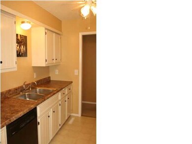 Looking into the kitchen from the dining area.