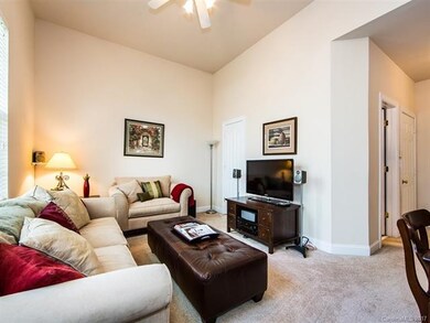 Second den/sitting room features a ceiling fan and
