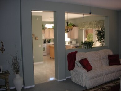 Living room showing open kitchen