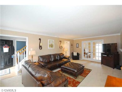 Living Room - The living room has newer carpet, a 